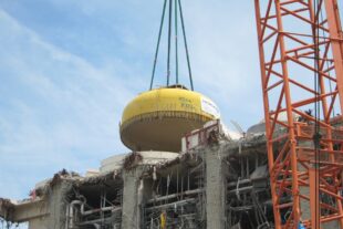 The upper lid is removed from Unit 4 at Fukushima Dai-ichi.