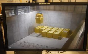 First Fuel Element Debris (FED) container being lowered into position at Interim Storage Facility (ISF) at Berkeley 