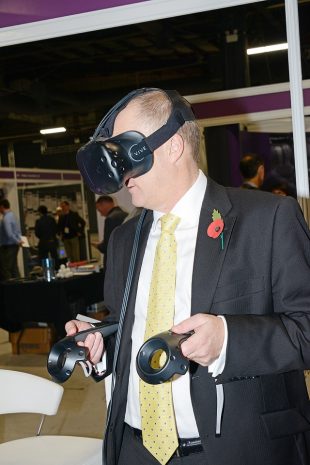 NDA CEO, John Clarke, tests out a virtual reality headset provided by Clicks & Links in our Innovation Zone