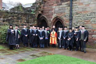 A line up of Project Academy graduates at Carlisle Cathedral